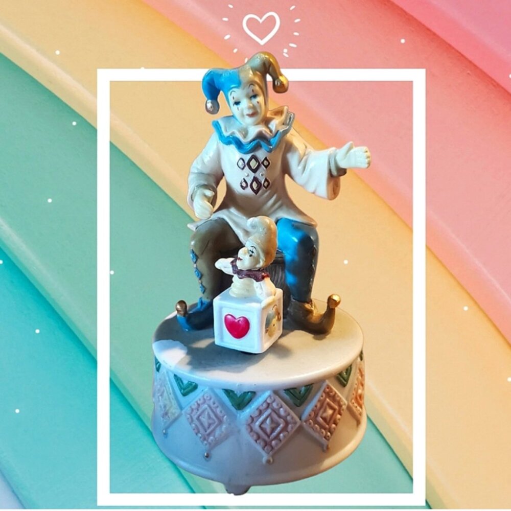 "It's A Small World" Porcelain Clown figurine Music Box